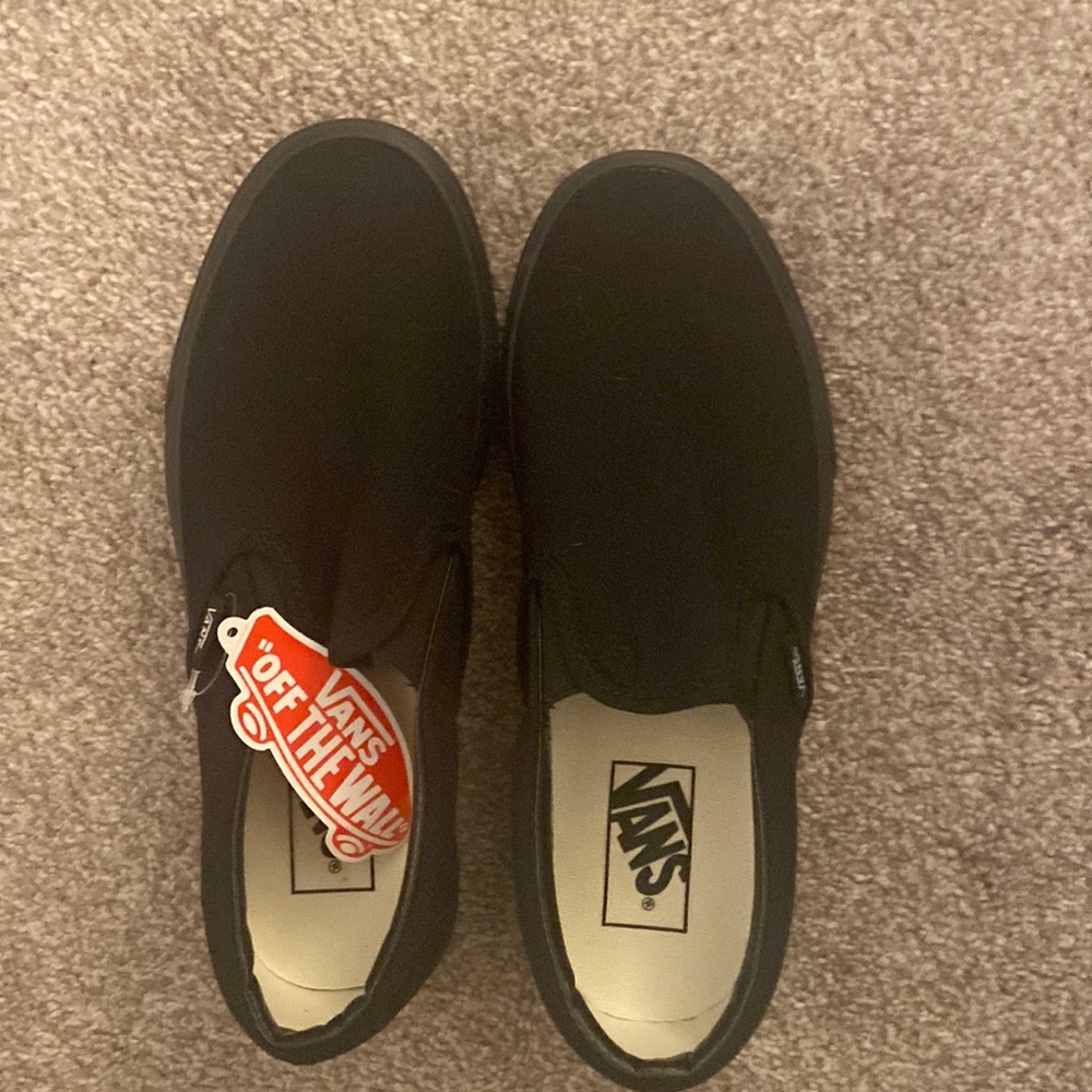Boys vans slip on black shoes brand new never worn. School approved .